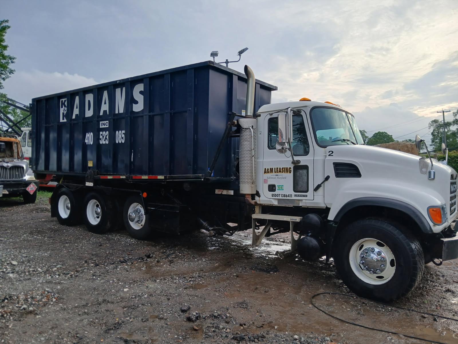 K & Adams Inc roll-off dumpster truck detailed by GBS Mobile Auto Detailing